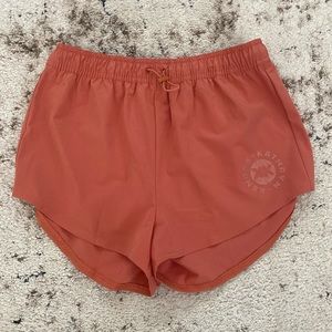 Gymshark Women's Athletic Shorts in Rust Orange